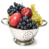 τα φρούτα, τα μήλα, σταφύλια, πράσινο, κίτρινο, μαύρο Niderlander - Dreamstime